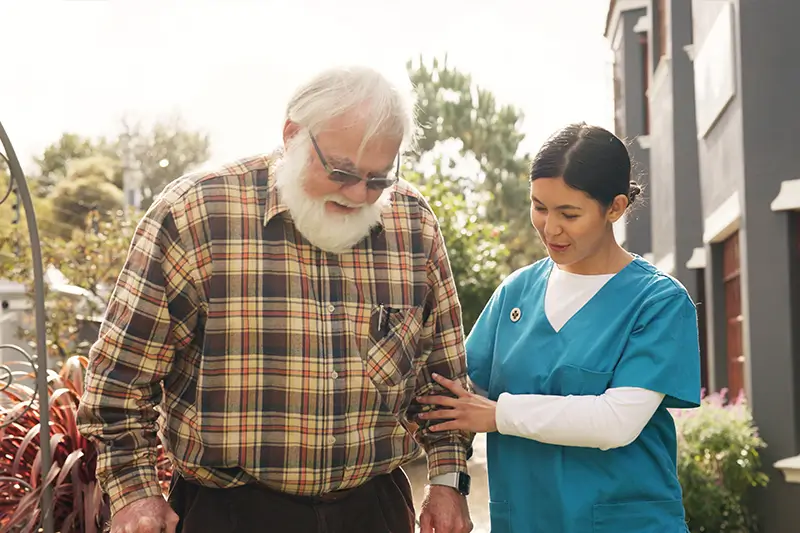 Registered nurse making a home visit to a client in Logan